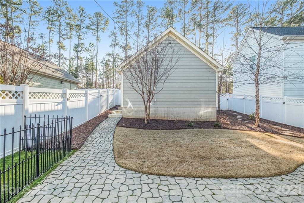 120 Helton Lane Fort Mill, SC 29708 - Photo 20 of 21 a view of a house with a small yard and wooden fence