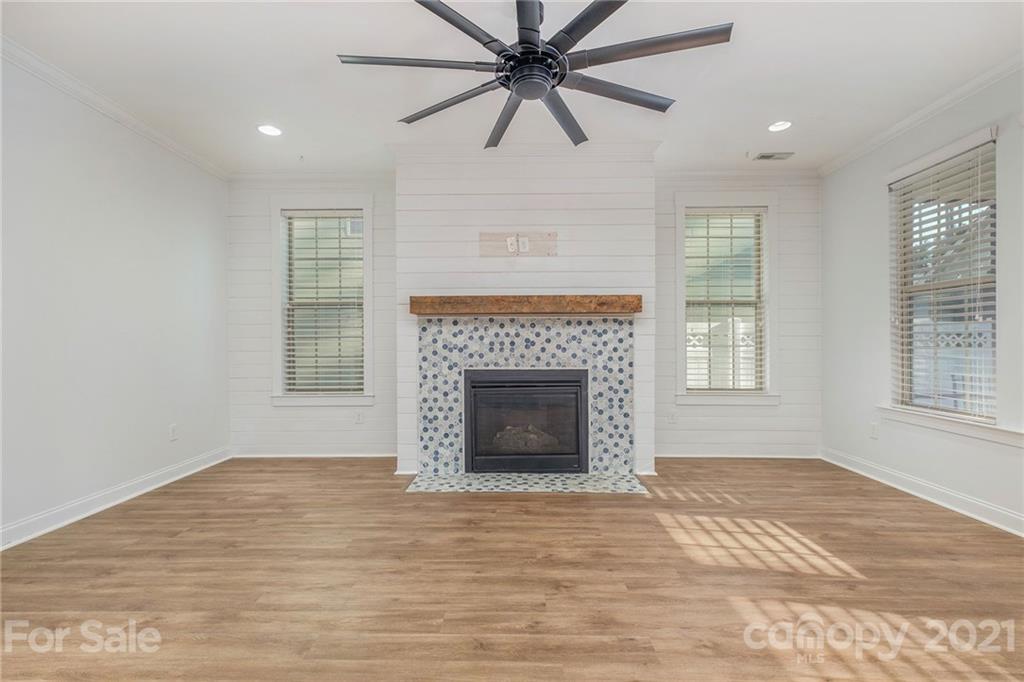 120 Helton Lane Fort Mill, SC 29708 - Photo 5 of 21 a view of an empty room with window and fire place