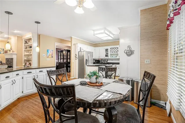 a view of a dining room with furniture