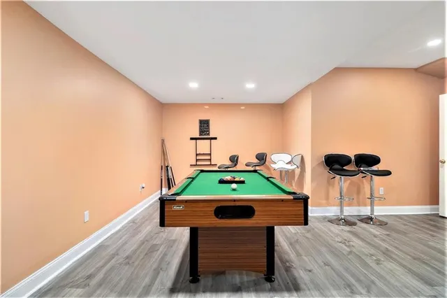 a room with table and chairs