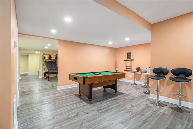 a room with furniture and wooden floor