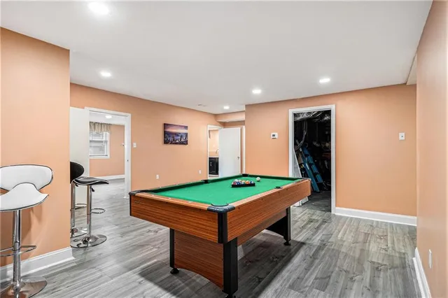 a room with table and chairs