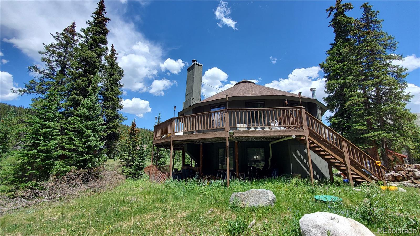 a view of a yard in front of house with a yard