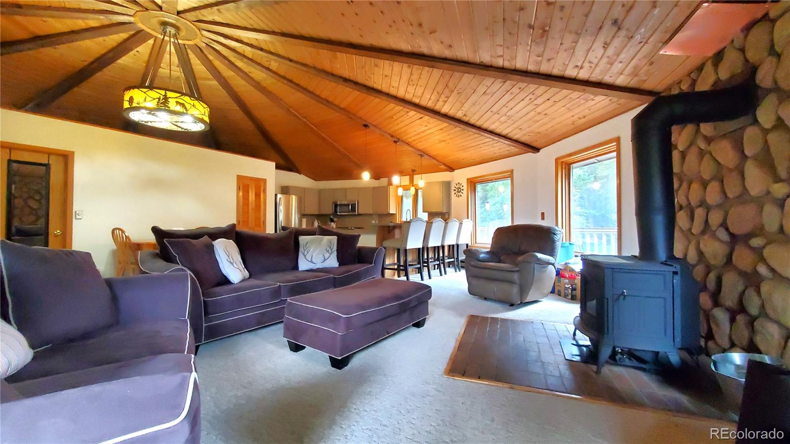 92 Scr 855 Breckenridge, CO 80424 - Photo 22 of 28 a outdoor living space with furniture and a flat screen tv