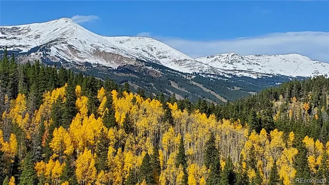 a view of a large body of water and mountain