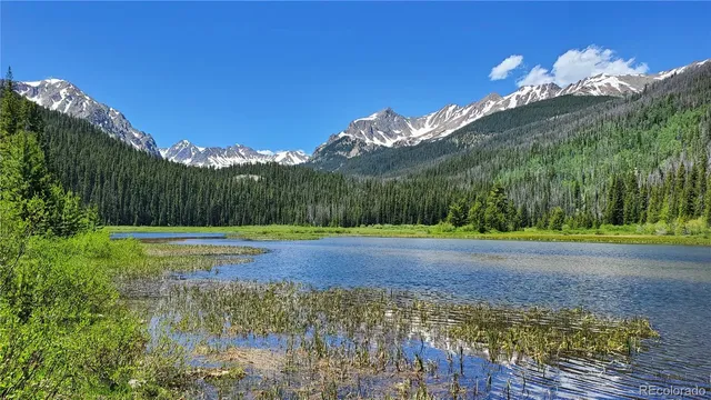 a view of a golf course with a house