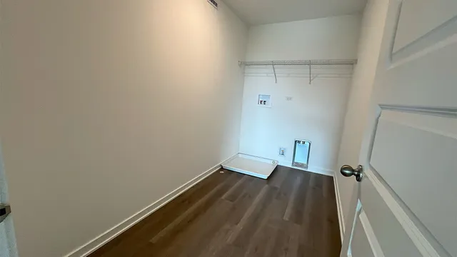 a view of small space with wooden floor