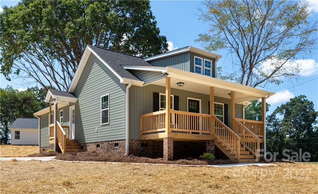 6184 Hopewell Road Hickory Grove, SC 29717 - Photo 1 of 30 a front view of a house with a yard