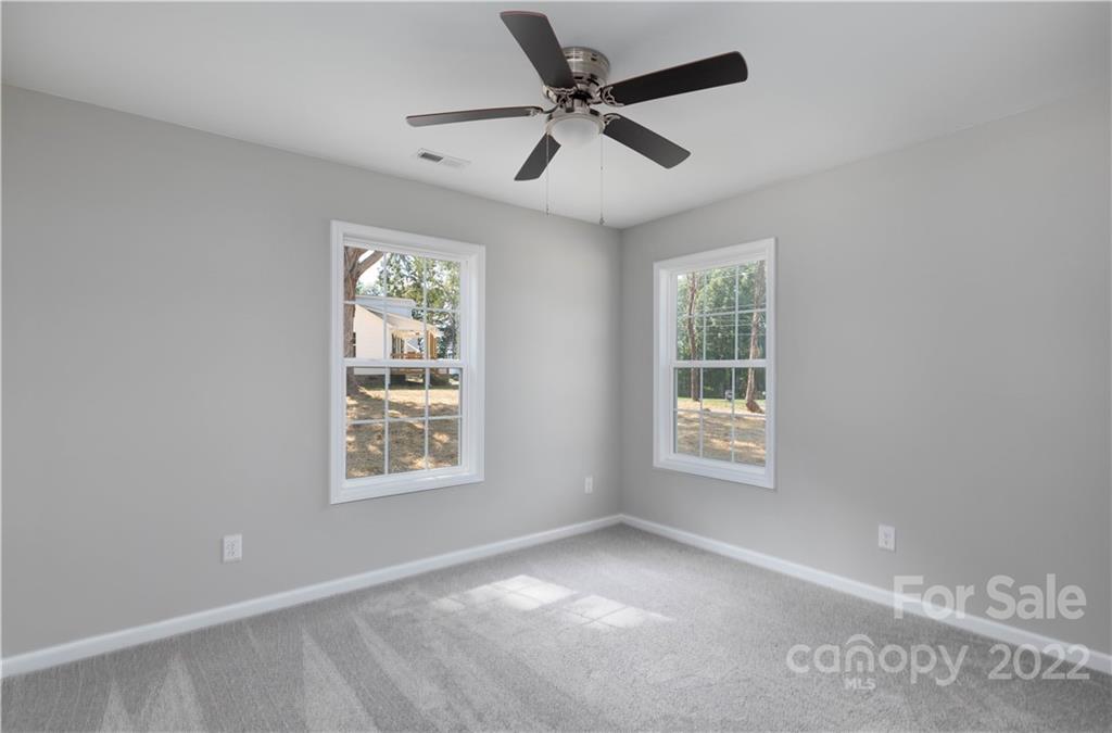 6184 Hopewell Road Hickory Grove, SC 29717 - Photo 23 of 30 a view of an empty room with windows