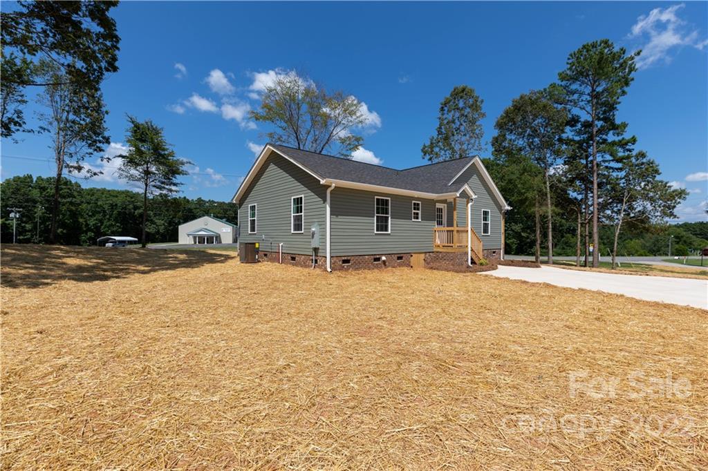 6184 Hopewell Road Hickory Grove, SC 29717 - Photo 7 of 30 a front view of a house with a yard