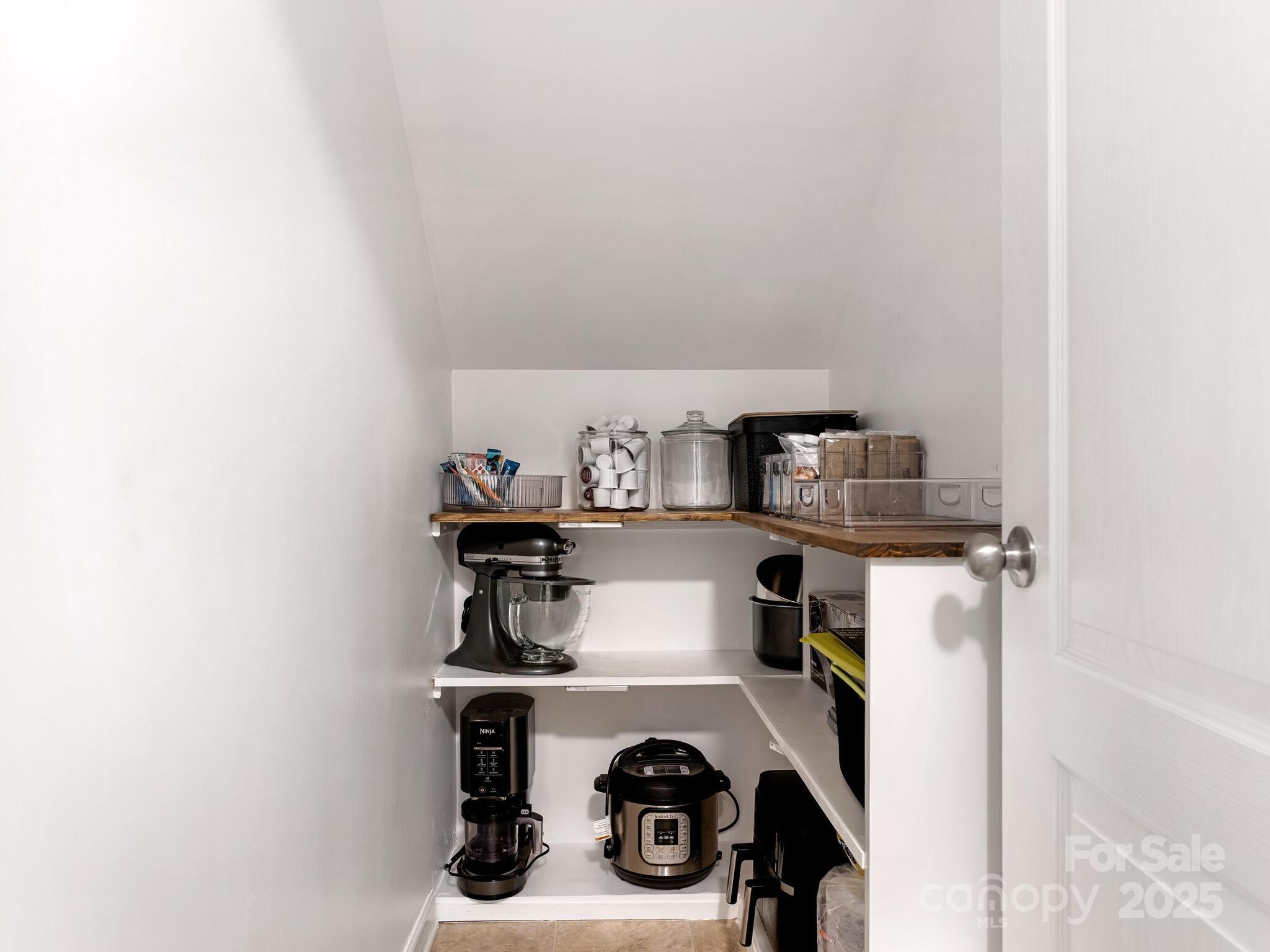 13118 Great Laurel Road Charlotte, NC 28227 - Photo 12 of 38 a view of storage and utility room with washer and dryer