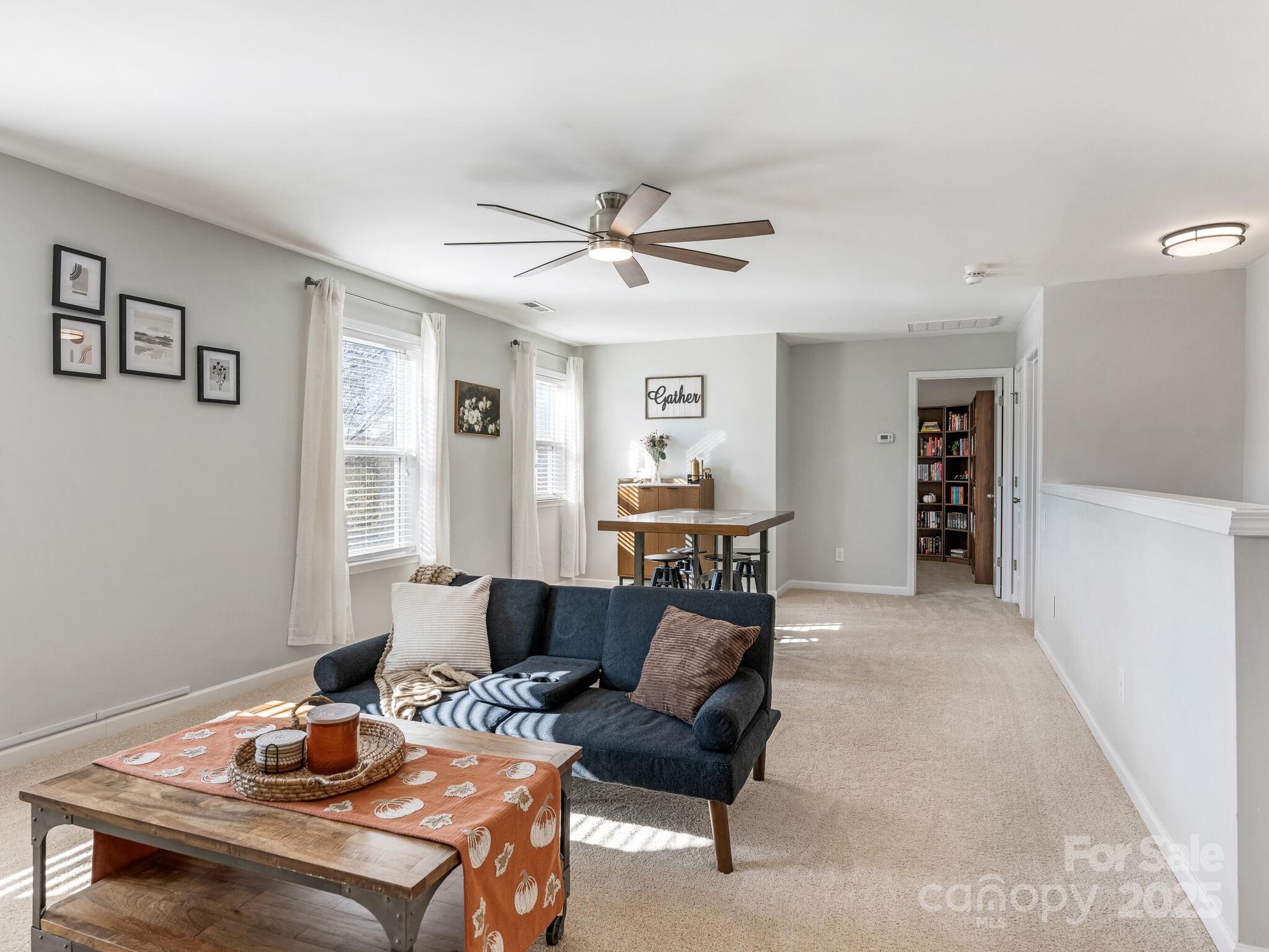 13118 Great Laurel Road Charlotte, NC 28227 - Photo 24 of 38 a living room with furniture and a table