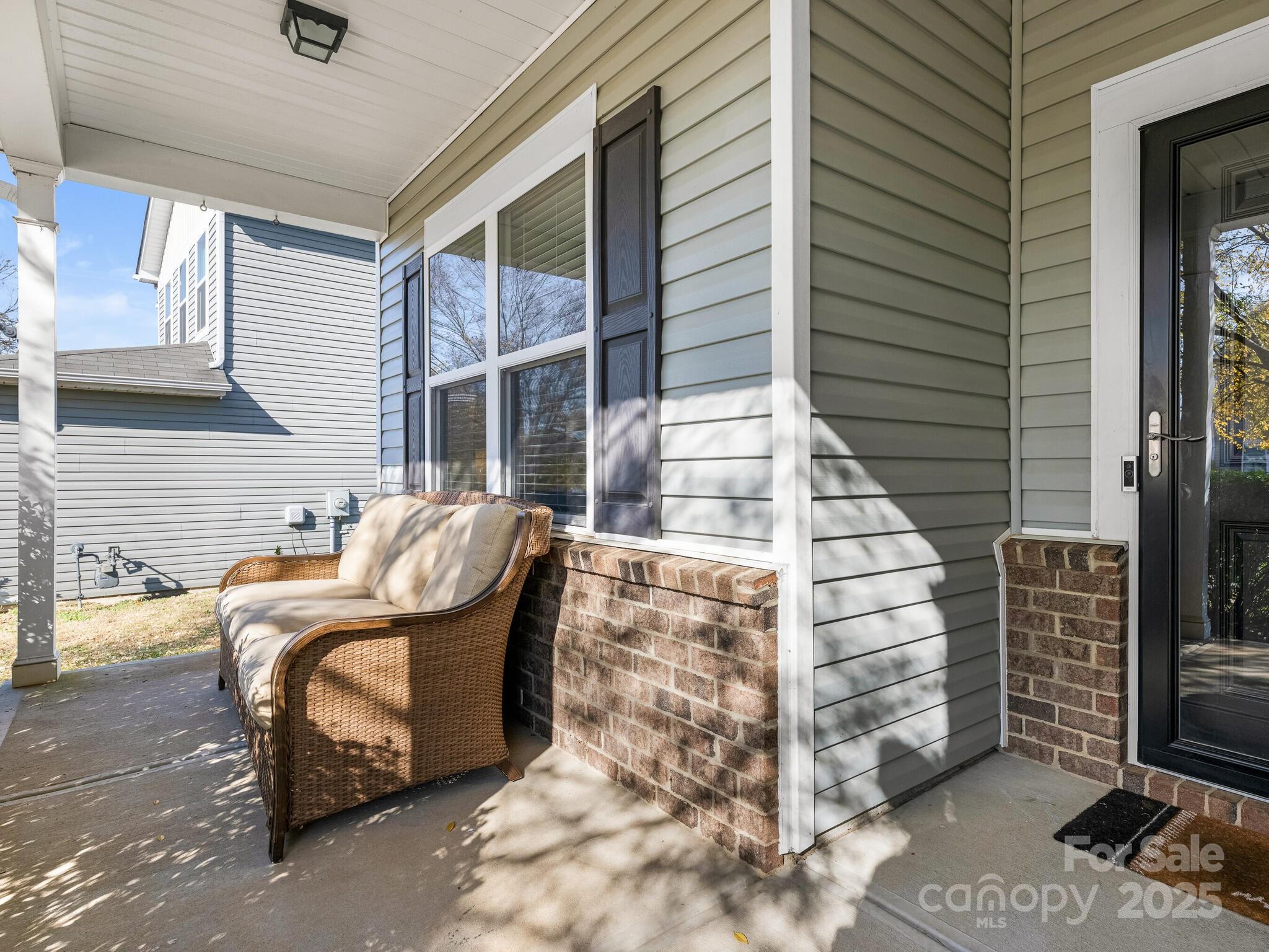 13118 Great Laurel Road Charlotte, NC 28227 - Photo 3 of 38 a view of a patio with chair and tables