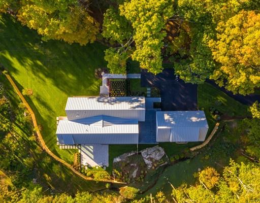 10 Sudbury Road Weston, MA 02493 - Photo 4 of 4 an aerial view of a house with yard swimming pool and outdoor seating