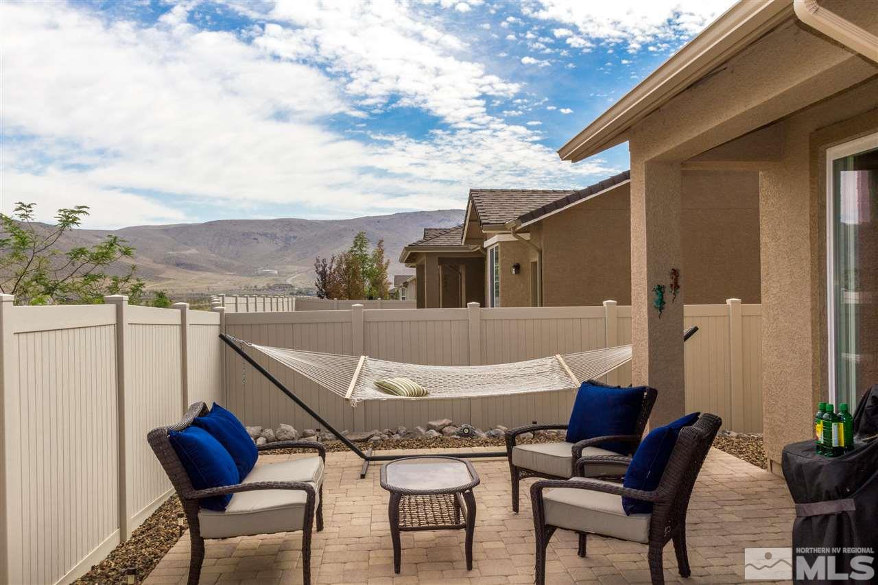 2285 Makenna Drive Reno, NV 89521 - Photo 18 of 24 a view of a terrace with furniture and a table