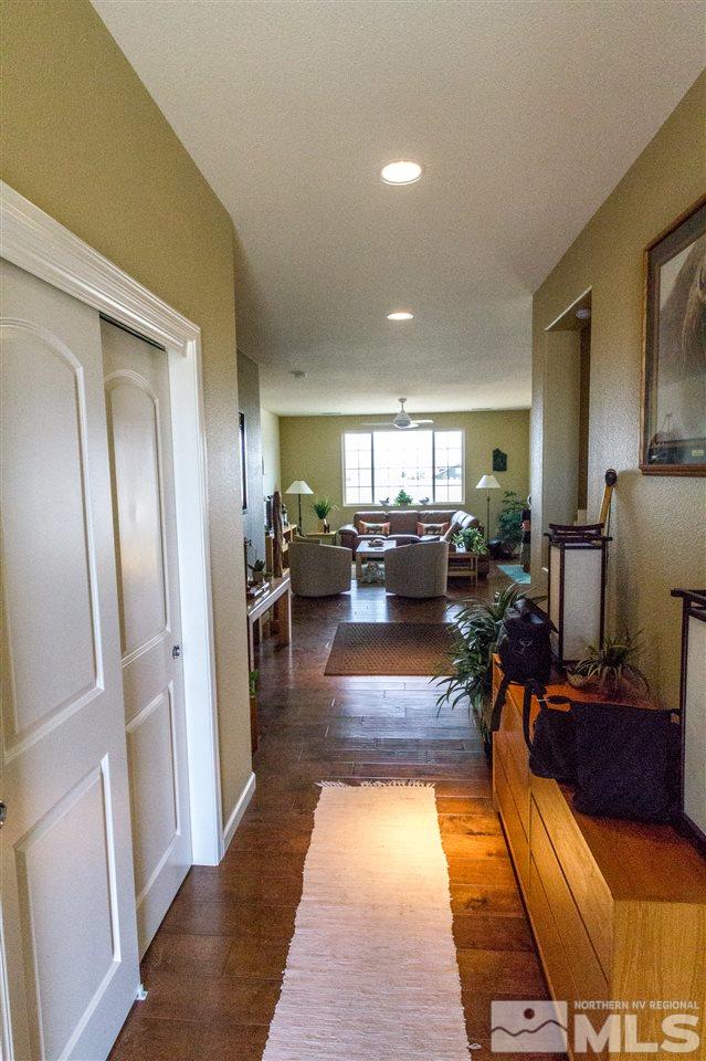 2285 Makenna Drive Reno, NV 89521 - Photo 5 of 24 a living room with furniture and a wooden floor