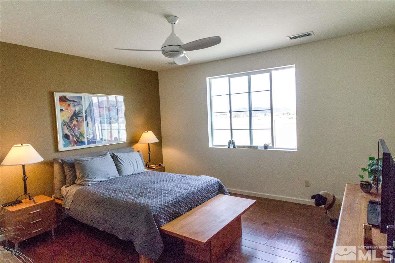 2285 Makenna Drive Reno, NV 89521 - Photo 10 of 24 a bedroom with a bed and a window