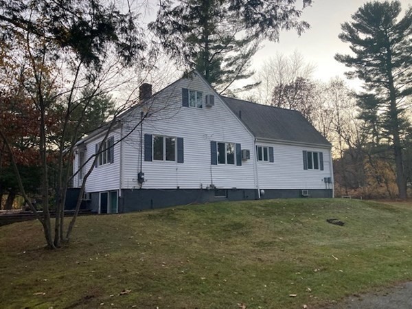51 Shawsheen Road Billerica, MA 01821 - Photo 3 of 24 a front view of a house with a garden