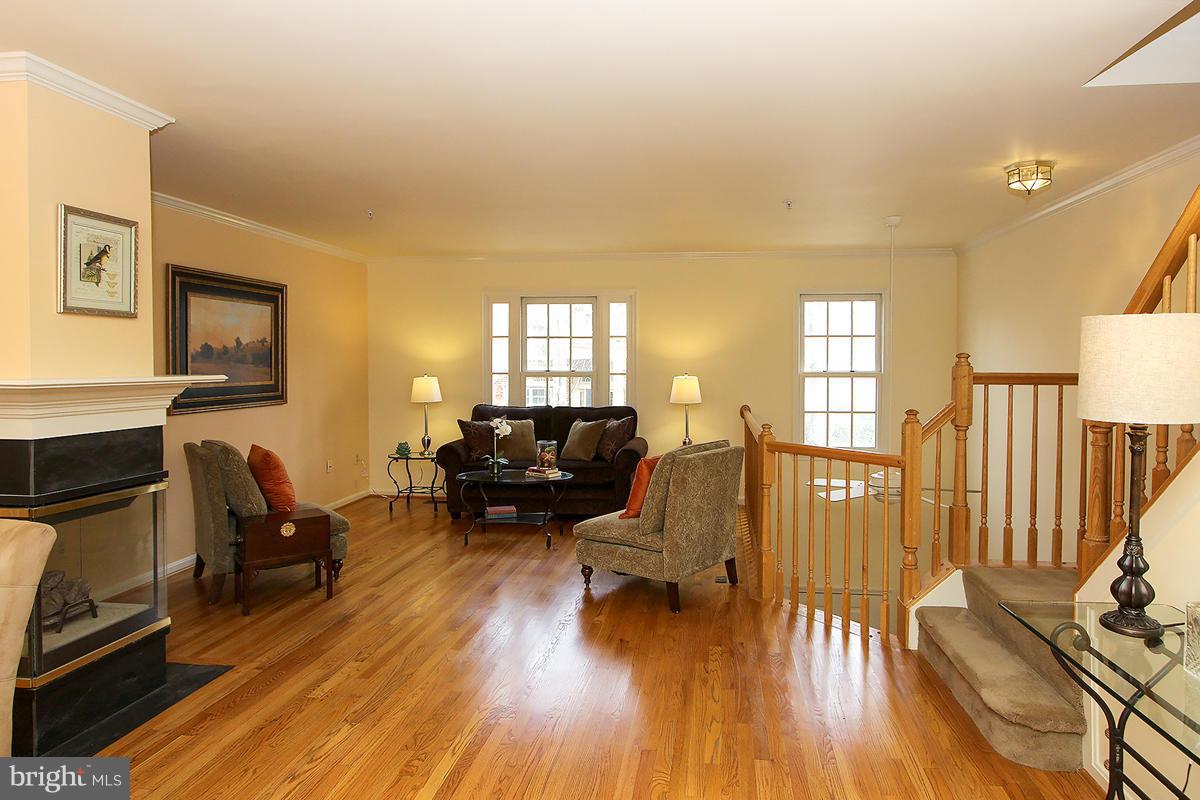 204 Ridgepoint Place Gaithersburg, MD 20878 - Photo 13 of 30 Living Room open view to the 2 story foyer