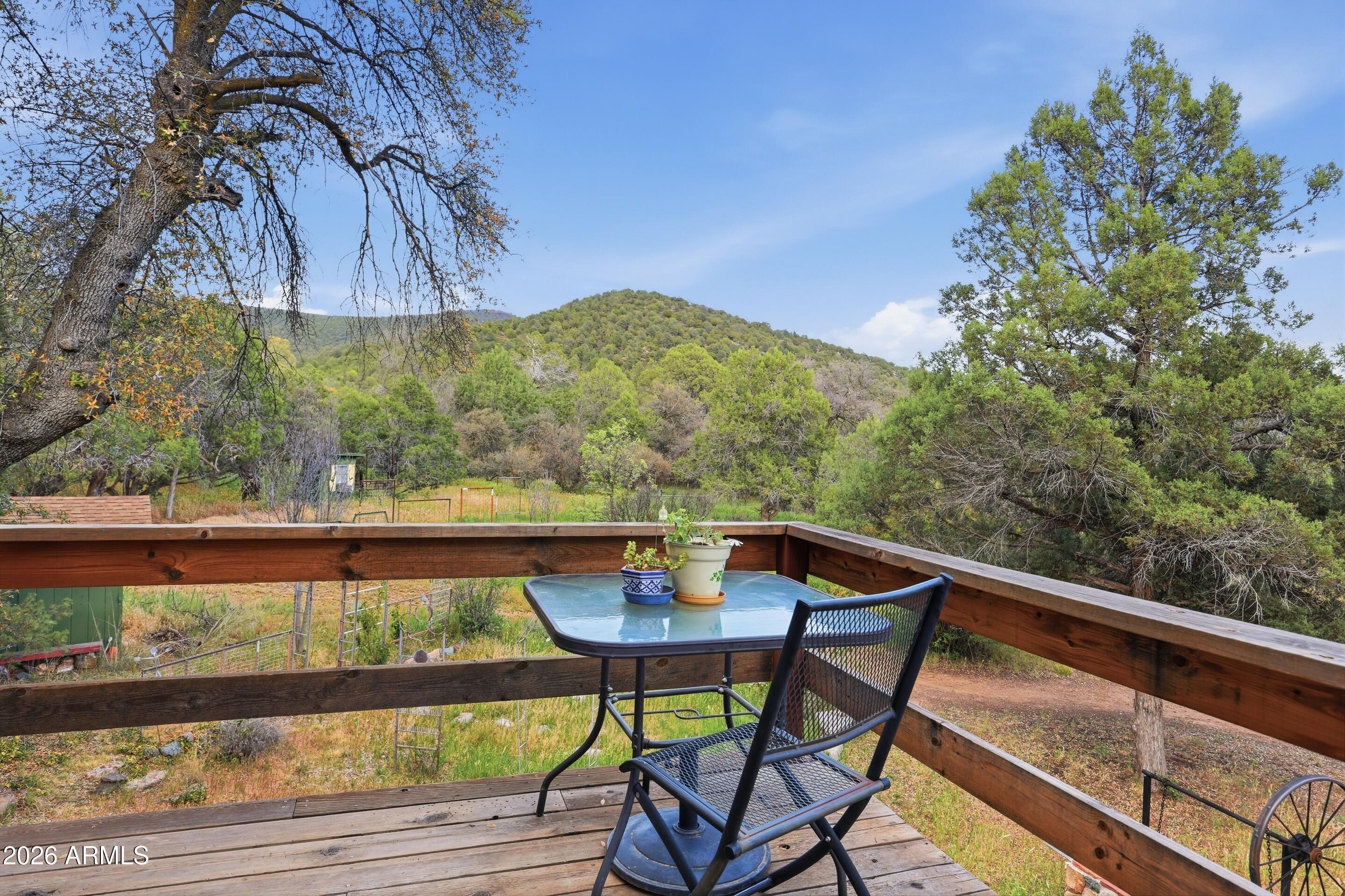8135 West Gibson Ranch Road Payson, AZ 85541 - Photo 21 of 43 a view of a chairs and table in patio