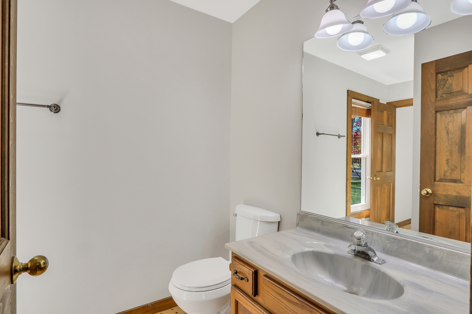 334 Concord Square Gurnee, IL 60031 - Photo 12 of 32 a bathroom with a sink vanity granite and toilet
