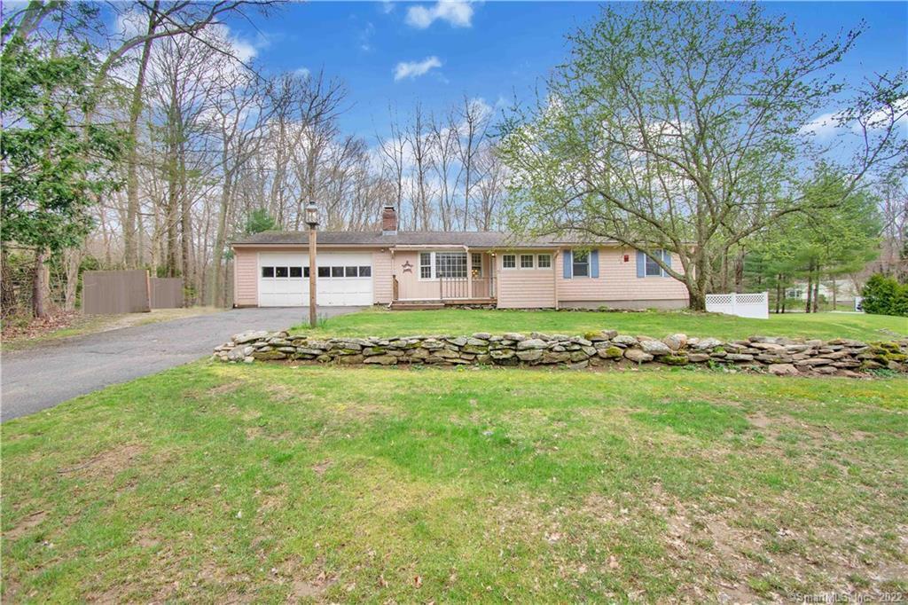 Gorgeous ranch with large level yard located in a neighborhood setting