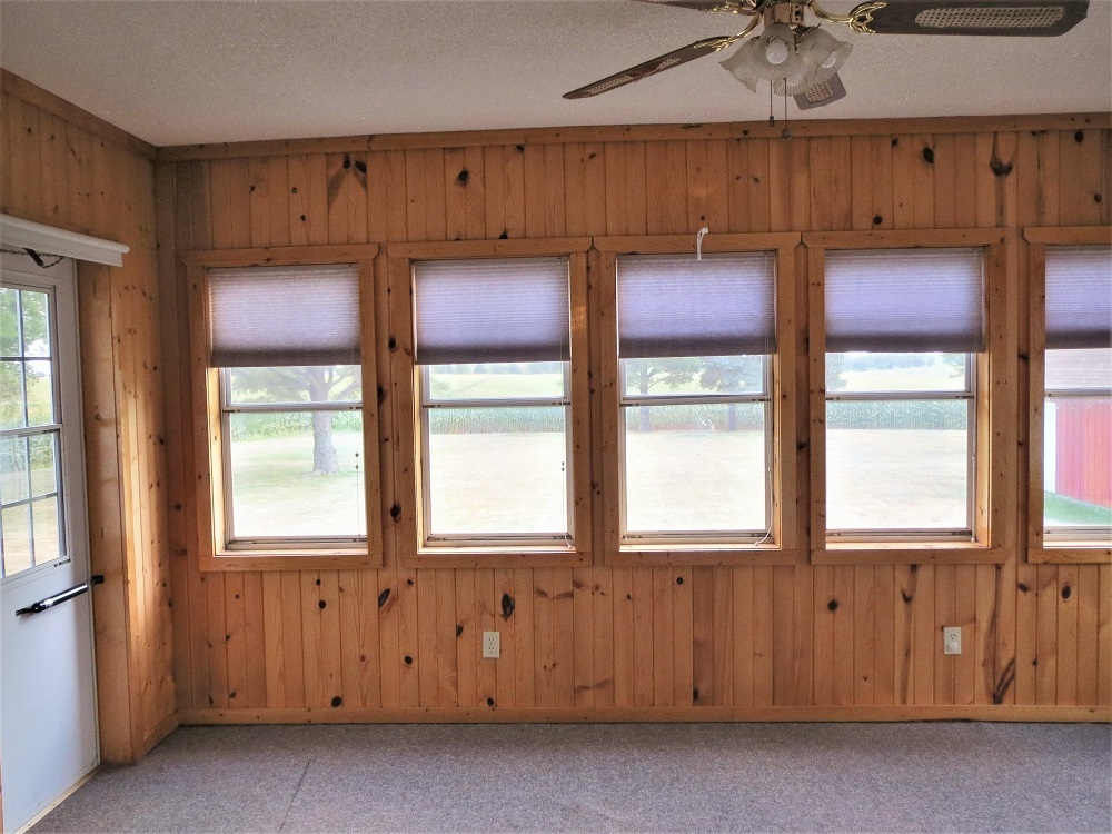 2086 Peek Home Road Dixon, IL 61021 - Photo 11 of 30 a kitchen with cabinets a sink and a window