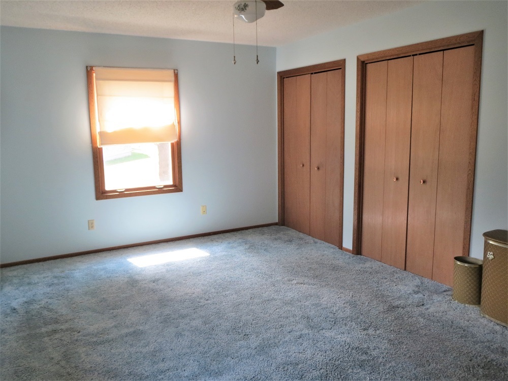 2086 Peek Home Road Dixon, IL 61021 - Photo 12 of 30 an empty room with windows and closet
