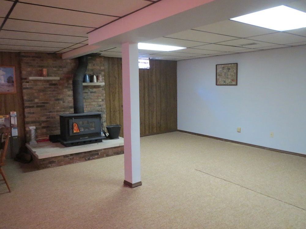 2086 Peek Home Road Dixon, IL 61021 - Photo 19 of 30 a view of an empty room and fire place