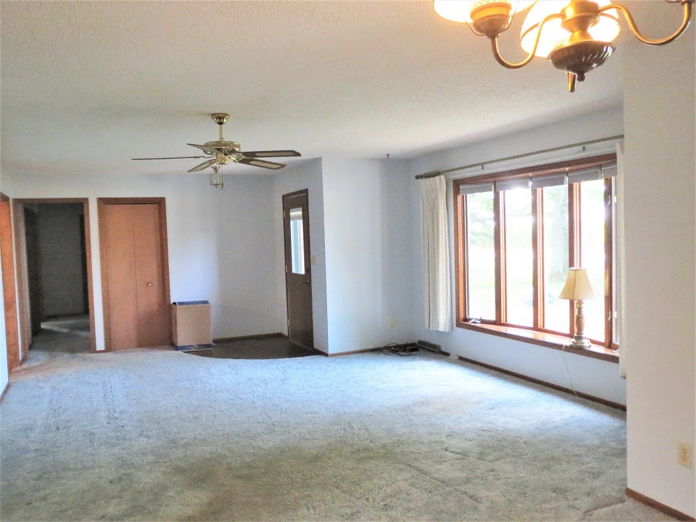 2086 Peek Home Road Dixon, IL 61021 - Photo 3 of 30 a view of an empty room with a window