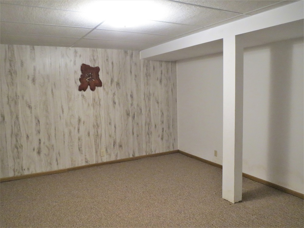 2086 Peek Home Road Dixon, IL 61021 - Photo 21 of 30 a view of a room with a wooden wall