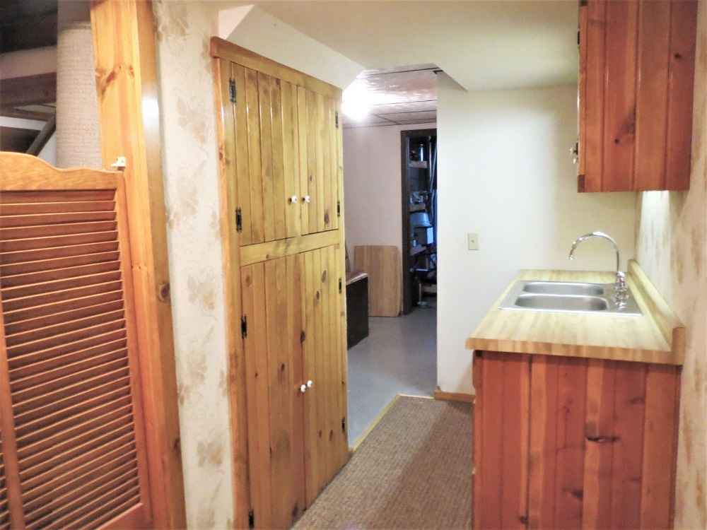 2086 Peek Home Road Dixon, IL 61021 - Photo 23 of 30 a kitchen that has a sink and a refrigerator