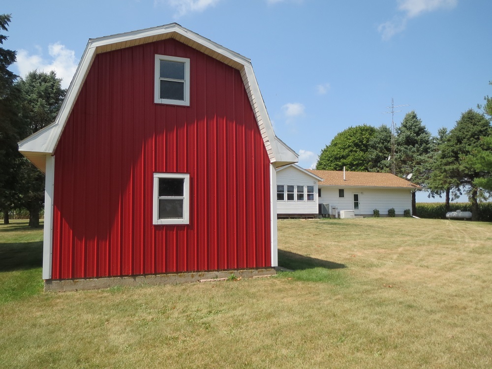 2086 Peek Home Road Dixon, IL 61021 - Photo 27 of 30 a front view of a house with a yard