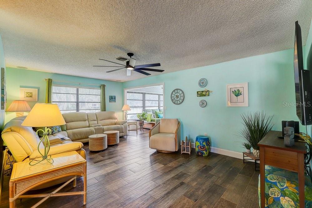 3454 Niblick Court New Port Richey, FL 34655 - Photo 21 of 54 a living room with furniture and a large window