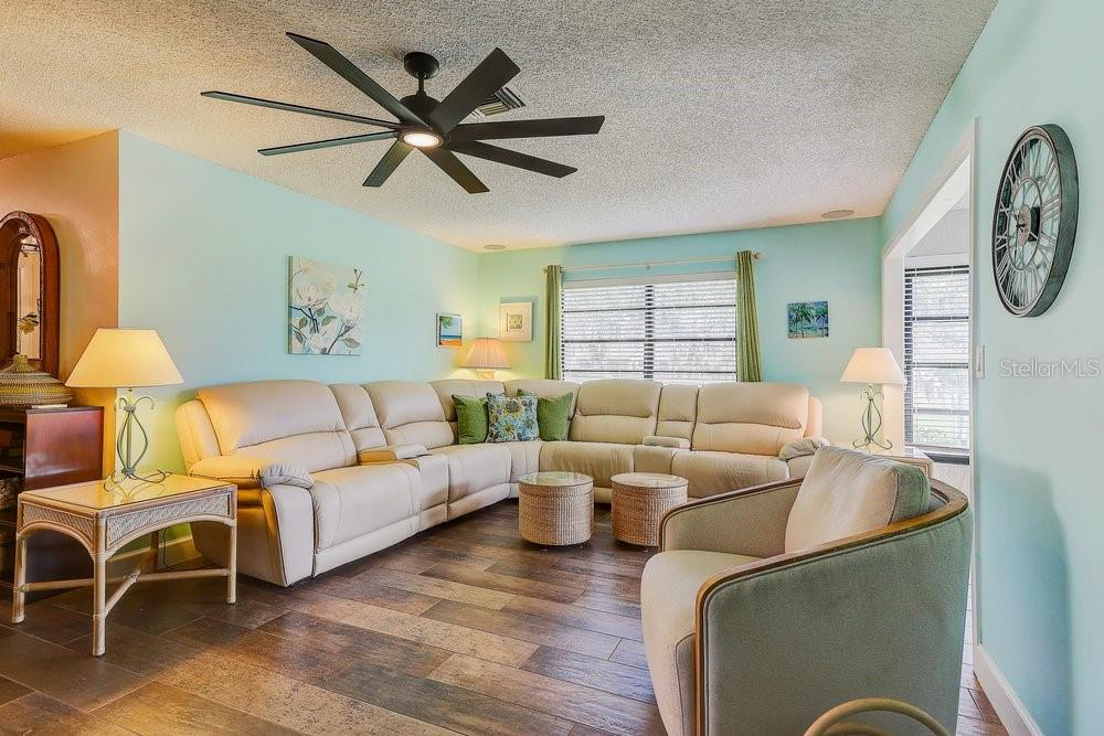 3454 Niblick Court New Port Richey, FL 34655 - Photo 22 of 54 a living room with furniture and a large window