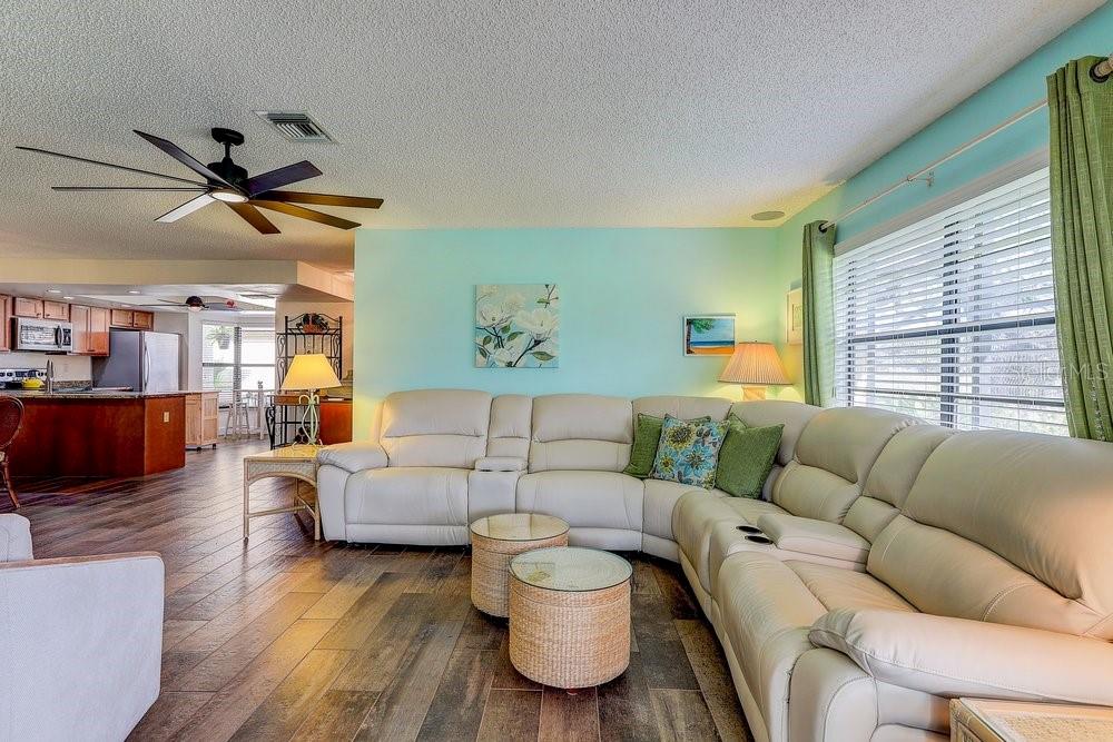 3454 Niblick Court New Port Richey, FL 34655 - Photo 23 of 54 a living room with furniture and a large window