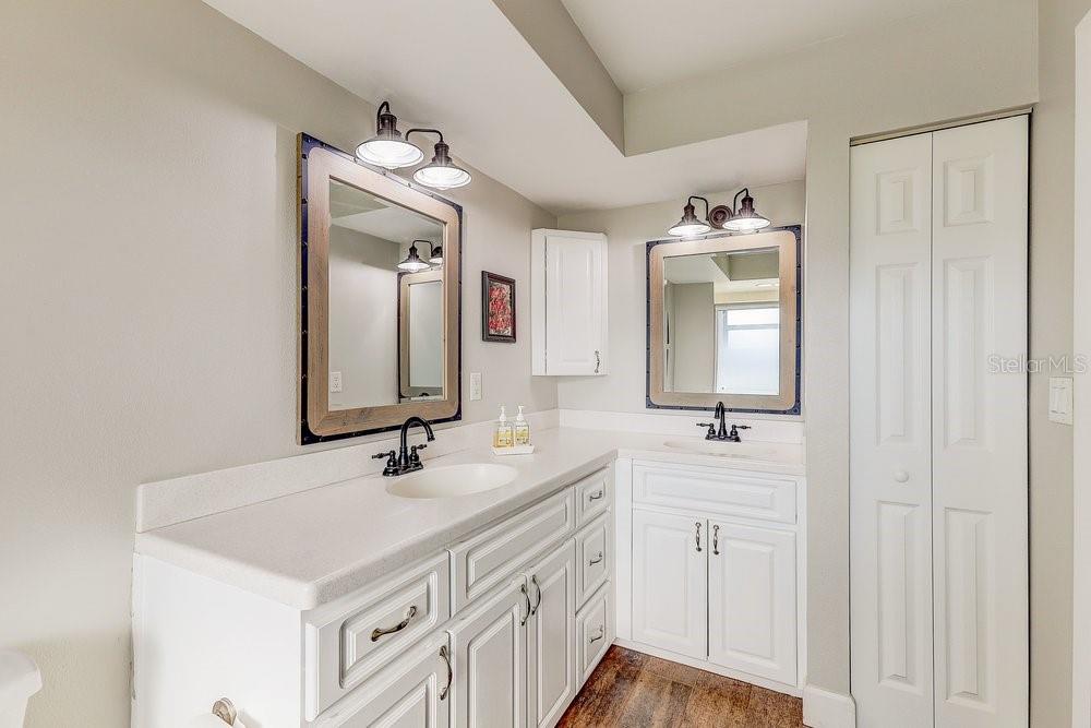 3454 Niblick Court New Port Richey, FL 34655 - Photo 28 of 54 a bathroom with a sink and a mirror