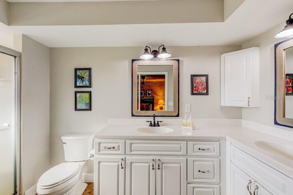 3454 Niblick Court New Port Richey, FL 34655 - Photo 29 of 54 a bathroom with a toilet sink and mirror