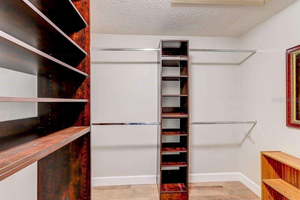 3454 Niblick Court New Port Richey, FL 34655 - Photo 31 of 54 a view of walk in closet with empty racks