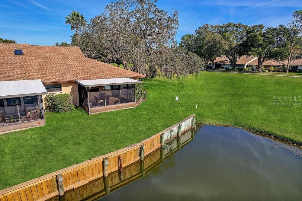 3454 Niblick Court New Port Richey, FL 34655 - Photo 39 of 54 a view of a house with a yard