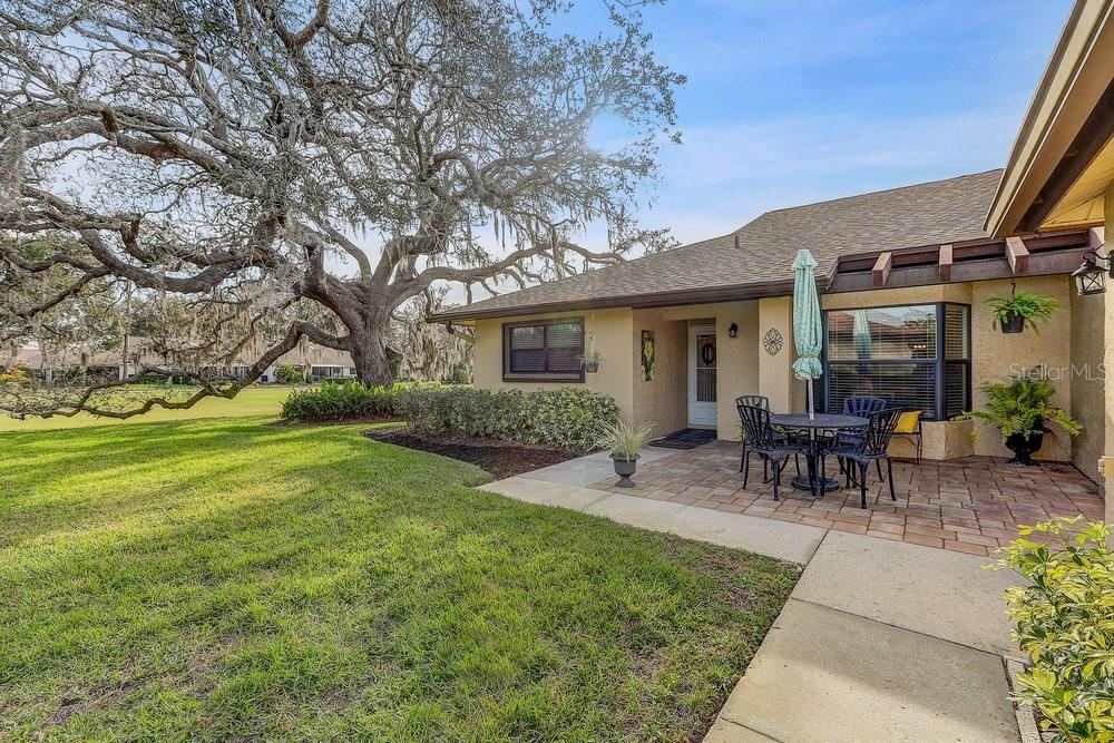 3454 Niblick Court New Port Richey, FL 34655 - Photo 8 of 54 a view of a house with backyard sitting area and garden