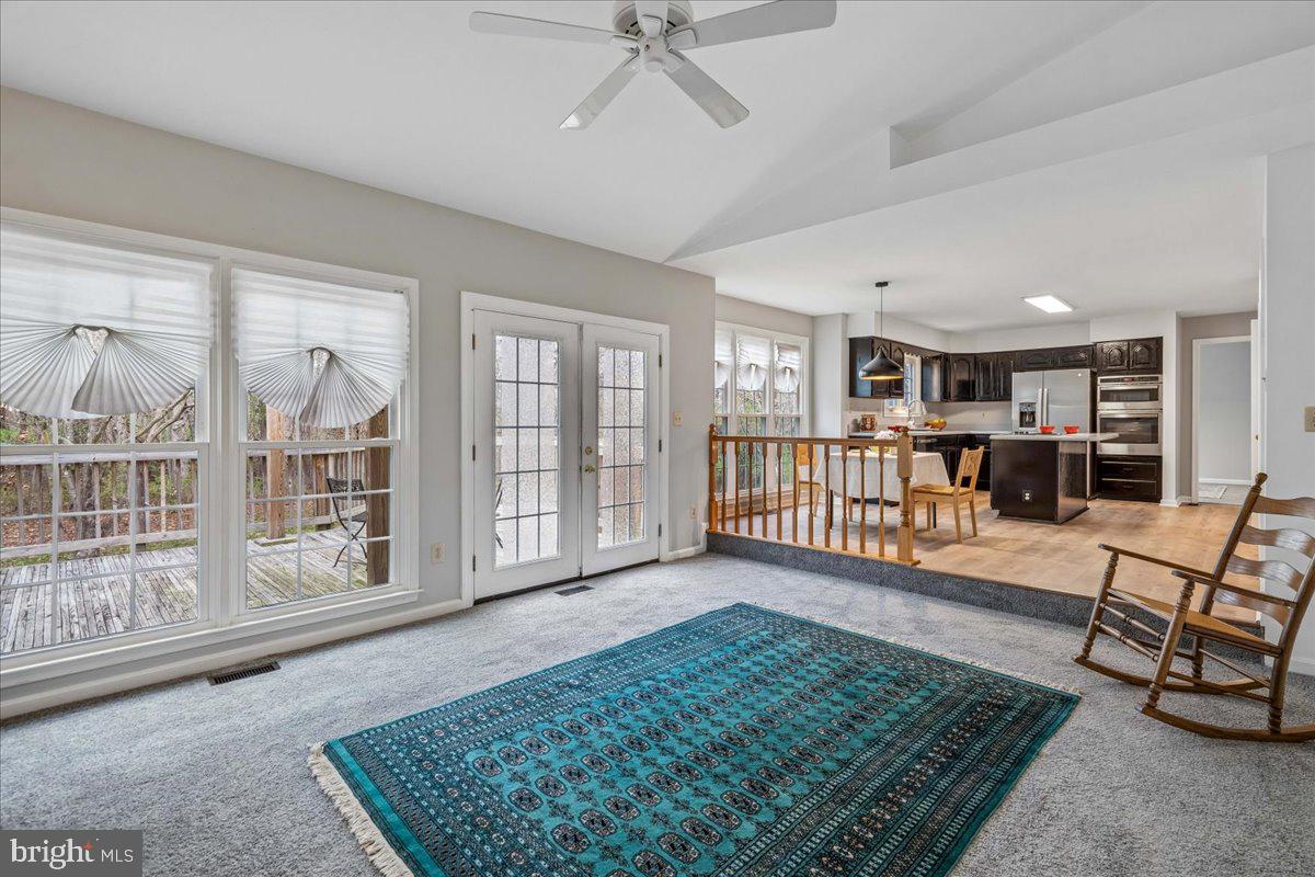 8010 Craddock Road Greenbelt, MD 20770 - Photo 24 of 49 a view of a livingroom with furniture and workspace