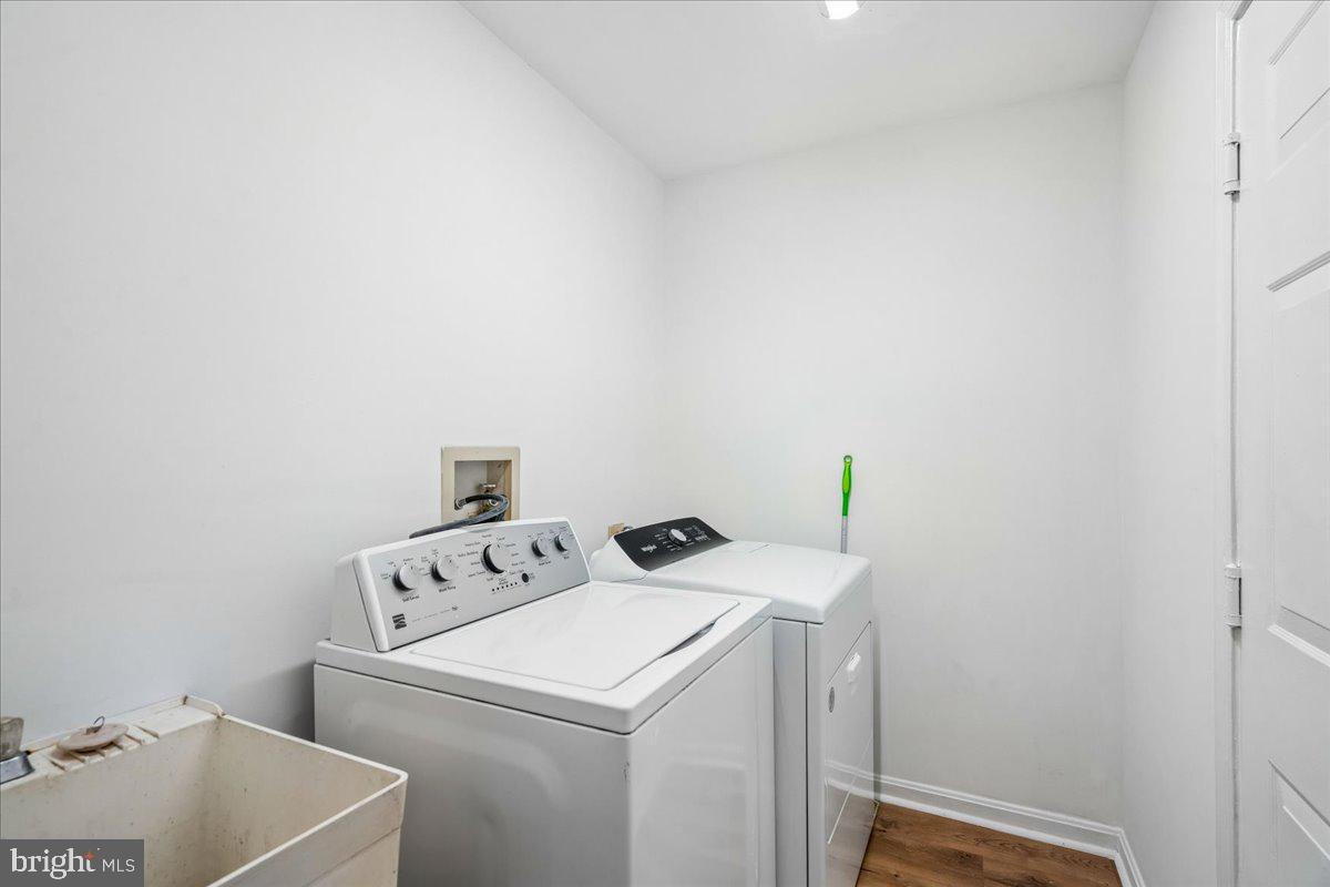 8010 Craddock Road Greenbelt, MD 20770 - Photo 26 of 49 a utility room with dryer and washer