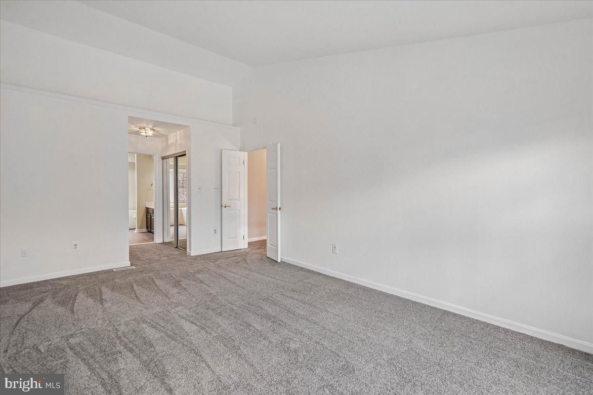 8010 Craddock Road Greenbelt, MD 20770 - Photo 30 of 49 a view of an empty room