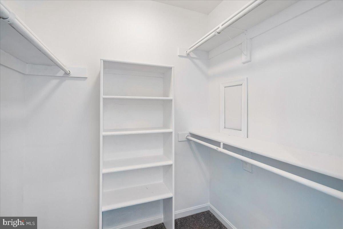 8010 Craddock Road Greenbelt, MD 20770 - Photo 31 of 49 a view of an empty walk in closet