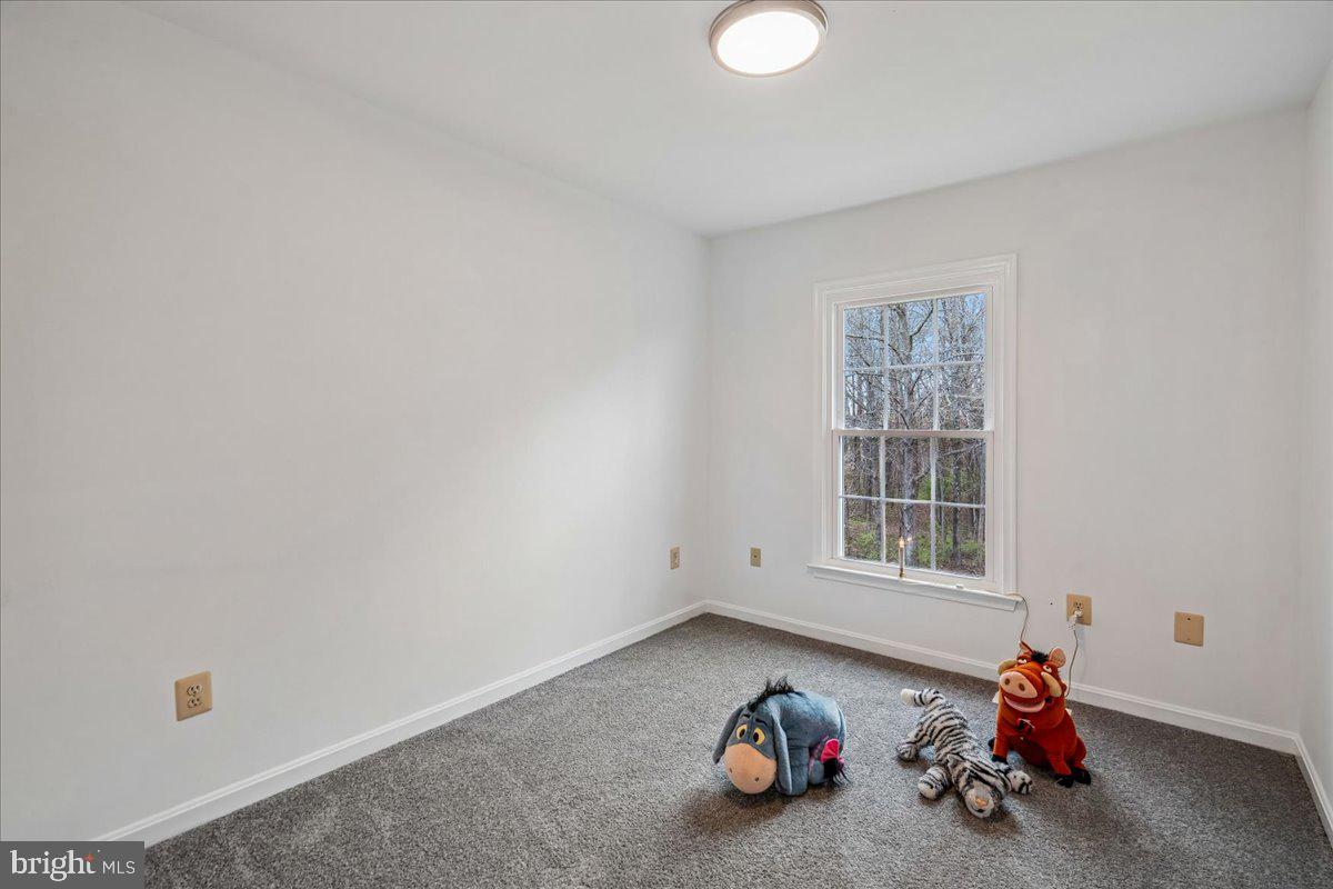 8010 Craddock Road Greenbelt, MD 20770 - Photo 34 of 49 a view of a room with air conditioner and a window