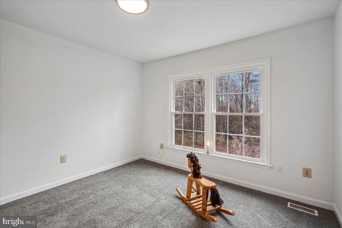 8010 Craddock Road Greenbelt, MD 20770 - Photo 35 of 49 a living room with furniture and a window