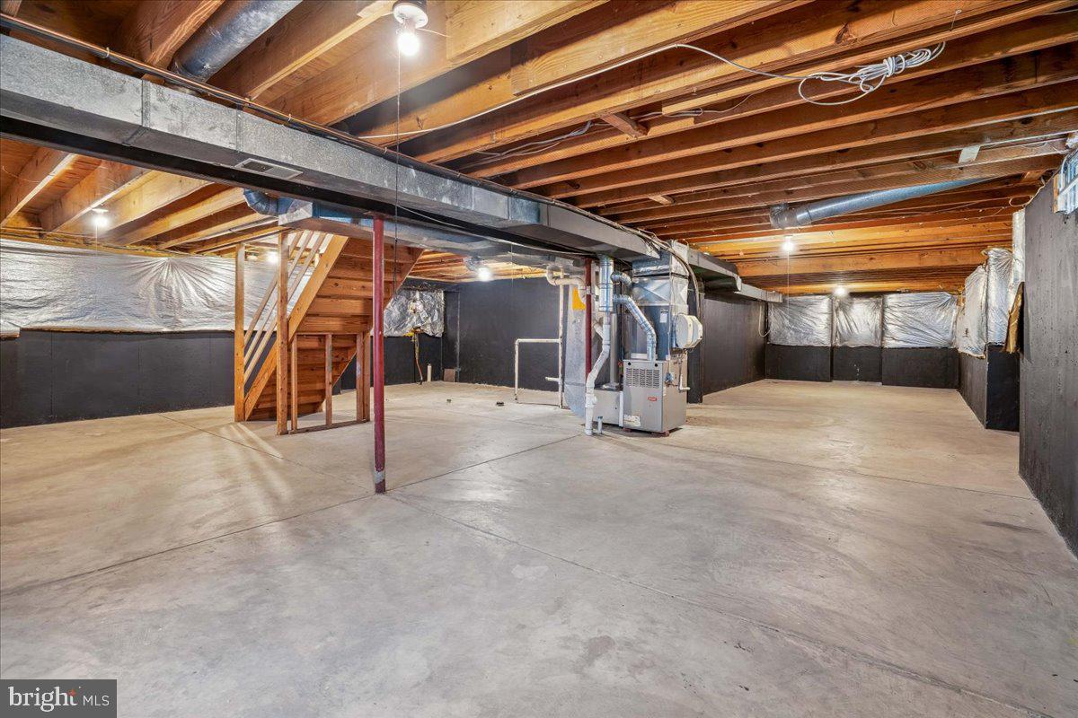 8010 Craddock Road Greenbelt, MD 20770 - Photo 39 of 49 a view of a room with wooden stairs