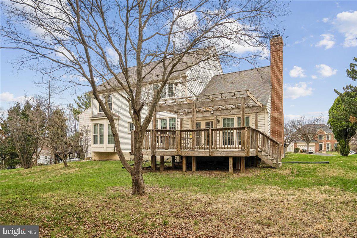8010 Craddock Road Greenbelt, MD 20770 - Photo 43 of 49 a view of house with a yard