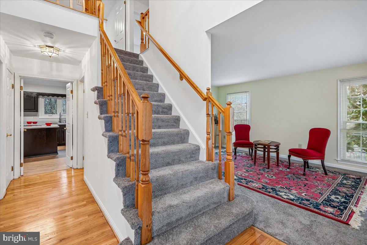 8010 Craddock Road Greenbelt, MD 20770 - Photo 5 of 49 a view of a livingroom with furniture and lounge chair